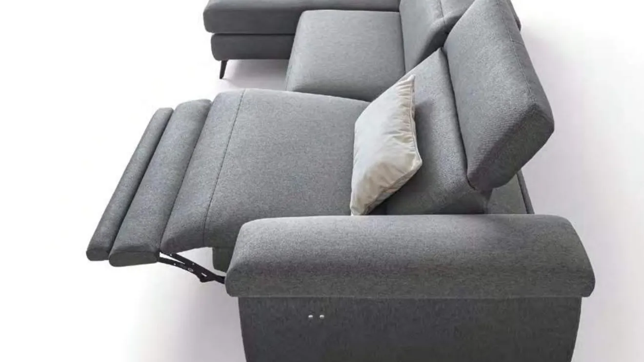 Divano con movimento relax in tessuto Zeno di Le Comfort